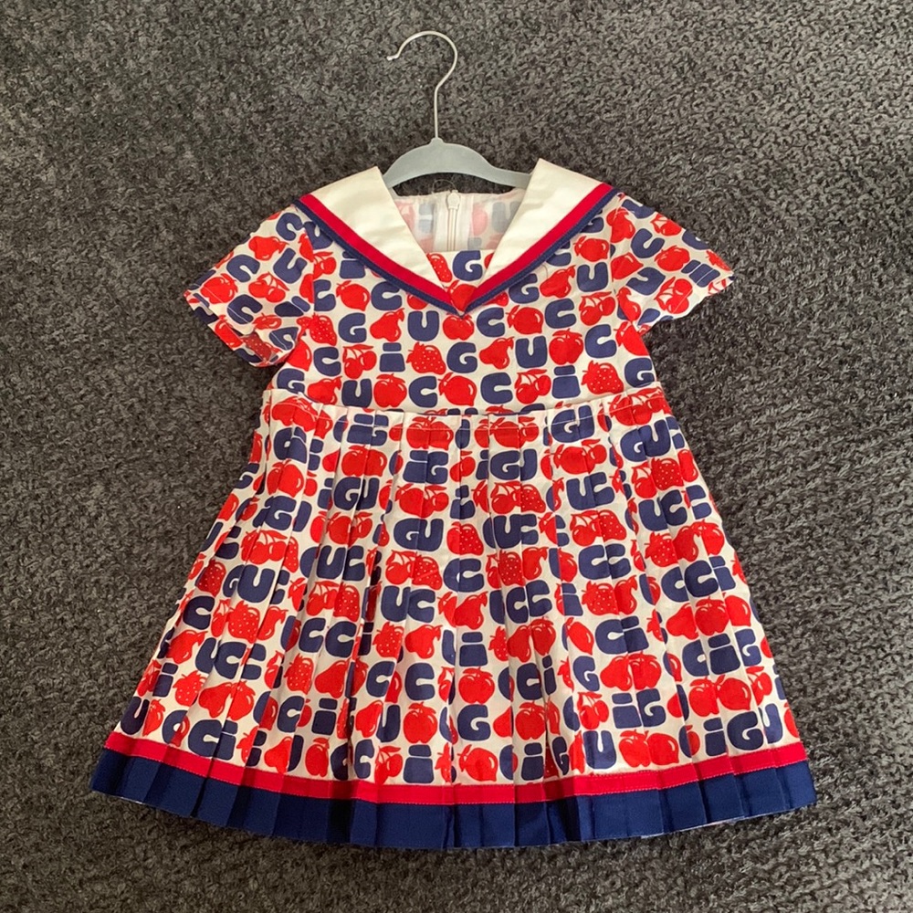 A brand new baby girls gucci dress, worn once. Like new.